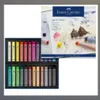 A set of Faber-Castell soft pastels is displayed in its packaging, alongside promotional material for the product. Náhľad obrázku produktu