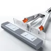 A close-up studio shot of a mop head and its handle attachment, against a white background. Produktbild-Vorschau
