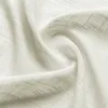 A close-up, draped view of a sheer, textured fabric with a subtle grid pattern. Anteprima dell’immagine prodotto