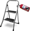 A two-step folding stepladder with certification tags attached. Produktbild-Vorschau