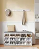 A shoe bench with storage compartments, a hat, and a scarf hanging on a coat rack above it. Produktbild-Vorschau