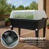 A raised garden bed with a clear lid, filled with plants, sitting on a wooden deck outdoors. Produktbild-Vorschau