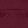 A close-up view of a maroon fabric with visible stitching and elastic gathering. Produktbild-Vorschau