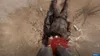 A first-person perspective of a person standing over a deceased individual with significant gore. Produktbild-Vorschau