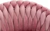 A close-up view of the tufted back of a pink velvet armchair with gold accents. Produktbild-Vorschau