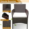 A close-up view of a brown rattan armchair with a white cushion, featuring text overlays highlighting its robust construction and material properties. Podgląd zdjęcia produktu