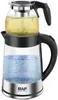A glass electric tea maker with a black handle and silver base, filled with yellow liquid in the top chamber and blue liquid in the bottom chamber. Produktbild-Vorschau