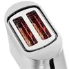 A close-up, top-down view of a stainless steel toaster with two slices of bread toasting inside. Produktbild-Vorschau