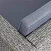 Close-up view of the corner of a polyrattan chair cushion and woven base. Produktbild-Vorschau