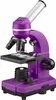 A purple Bresser junior Mikroskop Biolux SEL microscope is shown against a white background. Produktbild-Vorschau