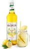 A bottle of Monin Limonade Mix concentrate and a glass of lemonade. Podgląd zdjęcia produktu