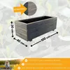A wooden planter box with dimensions indicated by arrows and text overlays. A woman is visible in the bottom left corner. Produktbild-Vorschau