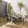 An outdoor dining set with a table and chairs on a wooden deck, with a ladder and olive tree in the background. Anteprima dell’immagine prodotto