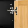 Close-up of a cabinet hinge connecting a black cabinet interior to a wooden door. Podgląd zdjęcia produktu