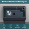 A close-up view of a dark gray mineral cast washbasin with dimensions and feature icons. Produktbild-Vorschau