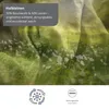 A close-up of fabric with a superimposed image of a meadow with white flowers and green grass. Text overlays describe the fabric's properties. Produktbild-Vorschau