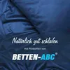 A dark blue fabric background with text overlay advertising a product. Produktbild-Vorschau