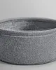 Close-up of a fabric basket against a plain background. Náhled obrázku produktu