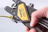 A hand is holding a wire stripping tool, with a wire being fed into it. Anteprima dell’immagine prodotto