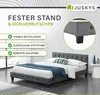 A marketing image for a Juskys bed frame, highlighting its stability features with text and icons, and showing a close-up of the bed frame's construction and legs. Náhled obrázku produktu