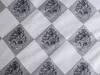 A repeating pattern of the Hogwarts crest on a diamond-shaped background. Náhled obrázku produktu
