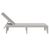 A side view of a gray plastic sun lounger on a white background. Podgląd zdjęcia produktu