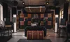 Acoustic wall panels are displayed in a studio setting, arranged around a sound system and seating area. Podgląd zdjęcia produktu