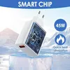 A white USB-C charger with a transparent casing showing its internal circuitry, placed on a block of ice with a snowy mountain background. Produktbild-Vorschau