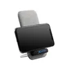 A smartphone is placed on a wireless charging stand. Produktbild-Vorschau