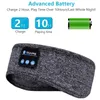A close-up marketing image of a grey Bluetooth headband with text overlays highlighting battery life and charging information. Náhľad obrázku produktu