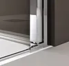 A close-up view of the bottom corner of a shower door, showing the track and hinge mechanism. Produktbild-Vorschau