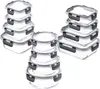 Several stacks of clear glass food storage containers with black locking lids are arranged on a white background. Produktbild-Vorschau