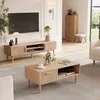 A modern living room with a TV stand and coffee table. Produktbild-Vorschau