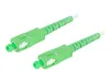 Two green fiber optic connectors with white cables against a white background. Anteprima dell’immagine prodotto