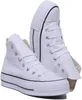 A pair of white high-top Converse sneakers. Voir les images du produit