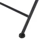 A close-up view of the black metal leg of a chair with a round black foot. Podgląd zdjęcia produktu