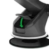 A close-up view of a black car mount with a green arrow indicating a lever action. Produktbild-Vorschau