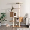 A multi-level cat tree with several cats interacting with it, placed in a living room setting. Podgląd zdjęcia produktu