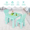 A mint green children's table and two chairs set with toy blocks on the table, set on a white rug. Produktbild-Vorschau