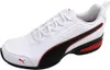 A single white Puma sneaker with black and red accents is shown against a white background. Produktbild-Vorschau