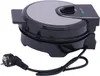 A black electric waffle maker with a silver top, shown on a white background with its power cord and plug visible. Náhled obrázku produktu