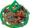 A pile of snow chains with a green plastic tool on top. Produktbild-Vorschau