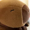 A close-up shot of a brown plush capybara toy. Podgląd zdjęcia produktu