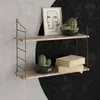 A two-tiered wall shelf with decorative items. Náhľad obrázku produktu