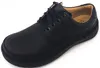 A black leather shoe on a white background. Anteprima dell’immagine prodotto