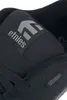Close-up view of the top of a black Etnies sneaker. Produktbild-Vorschau