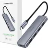 A product shot of a USB hub and its packaging. Produktbild-Vorschau