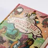 A close-up view of a children's book cover with illustrations of animals and children in winter clothing. Voir les images du produit
