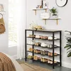 A shoe rack filled with shoes and accessories against a wall with shelves. Náhled obrázku produktu