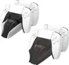Two white PS5 controllers are shown docked in black charging stations. Produktbild-Vorschau